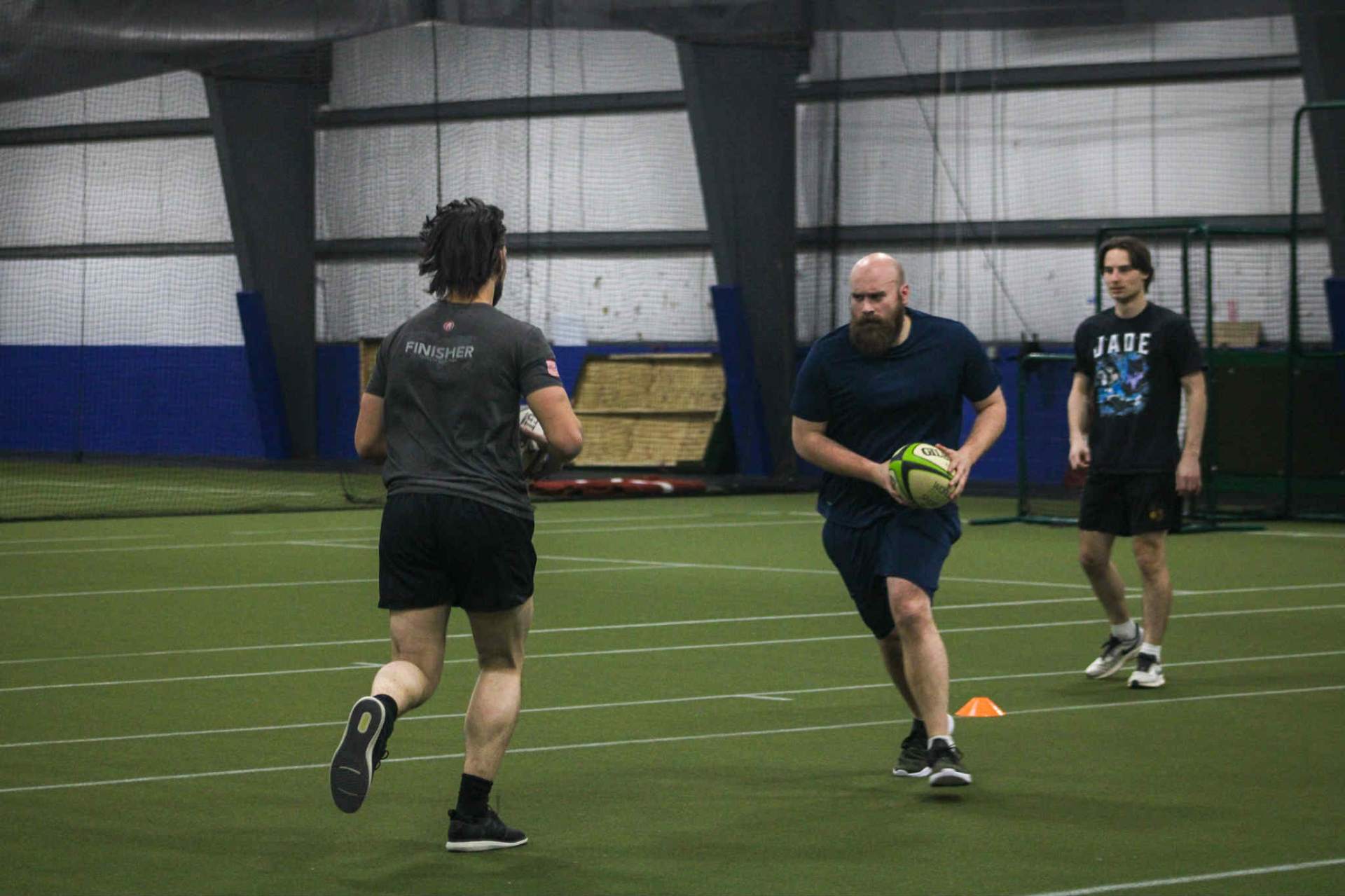 Berserkers players practicing passes